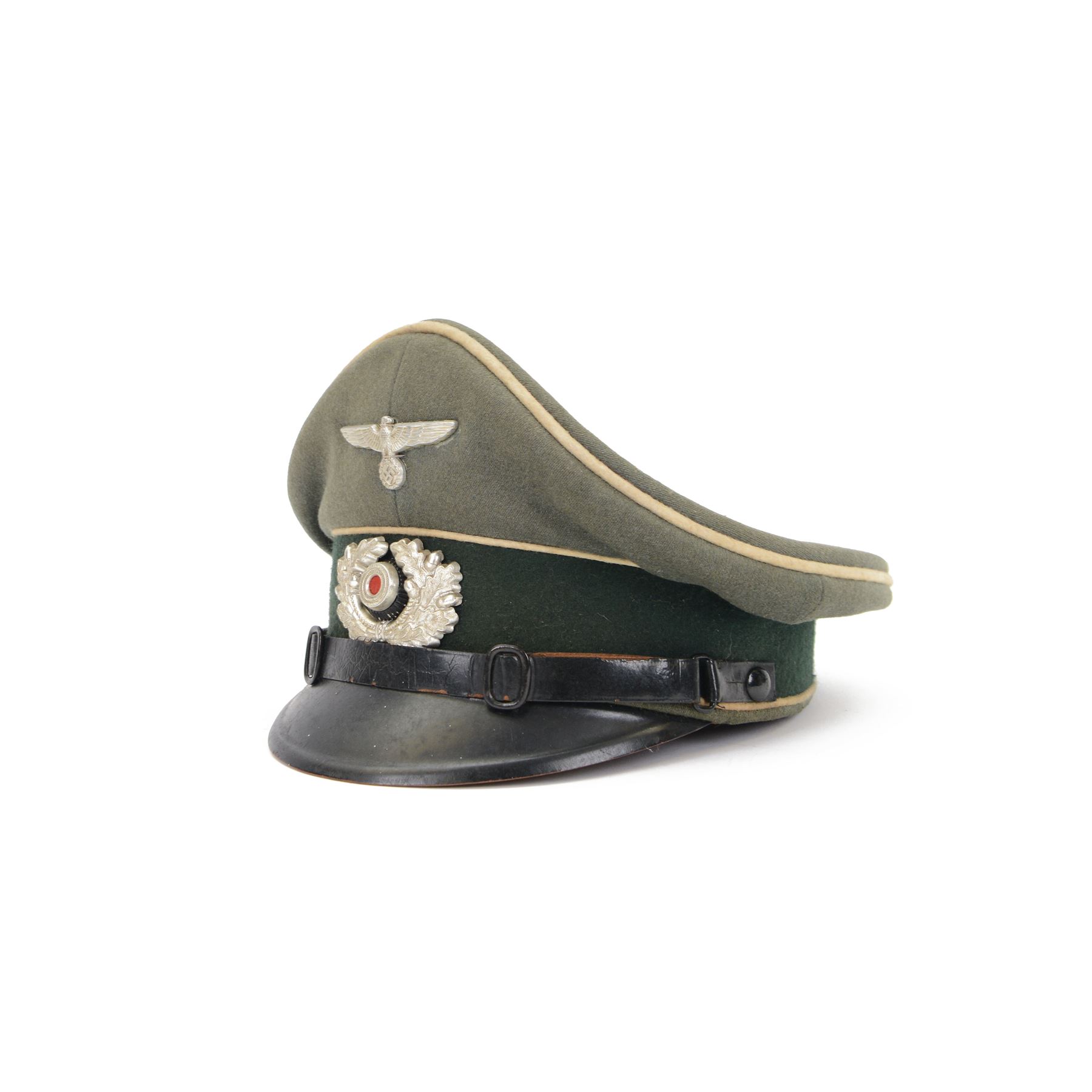 WWII German, Third Reich army NCO visor cap, green doeskin wool with a forest green centreband and cream piping, featuring a silver alloy army eagle and a silvered wreath