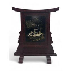 20th century Japanese lacquered table screen, top rail with slight curve and floral painted design, central panel depicting a river scene with Mount Fuji in the background, flanked by shaped supports on rectangular base