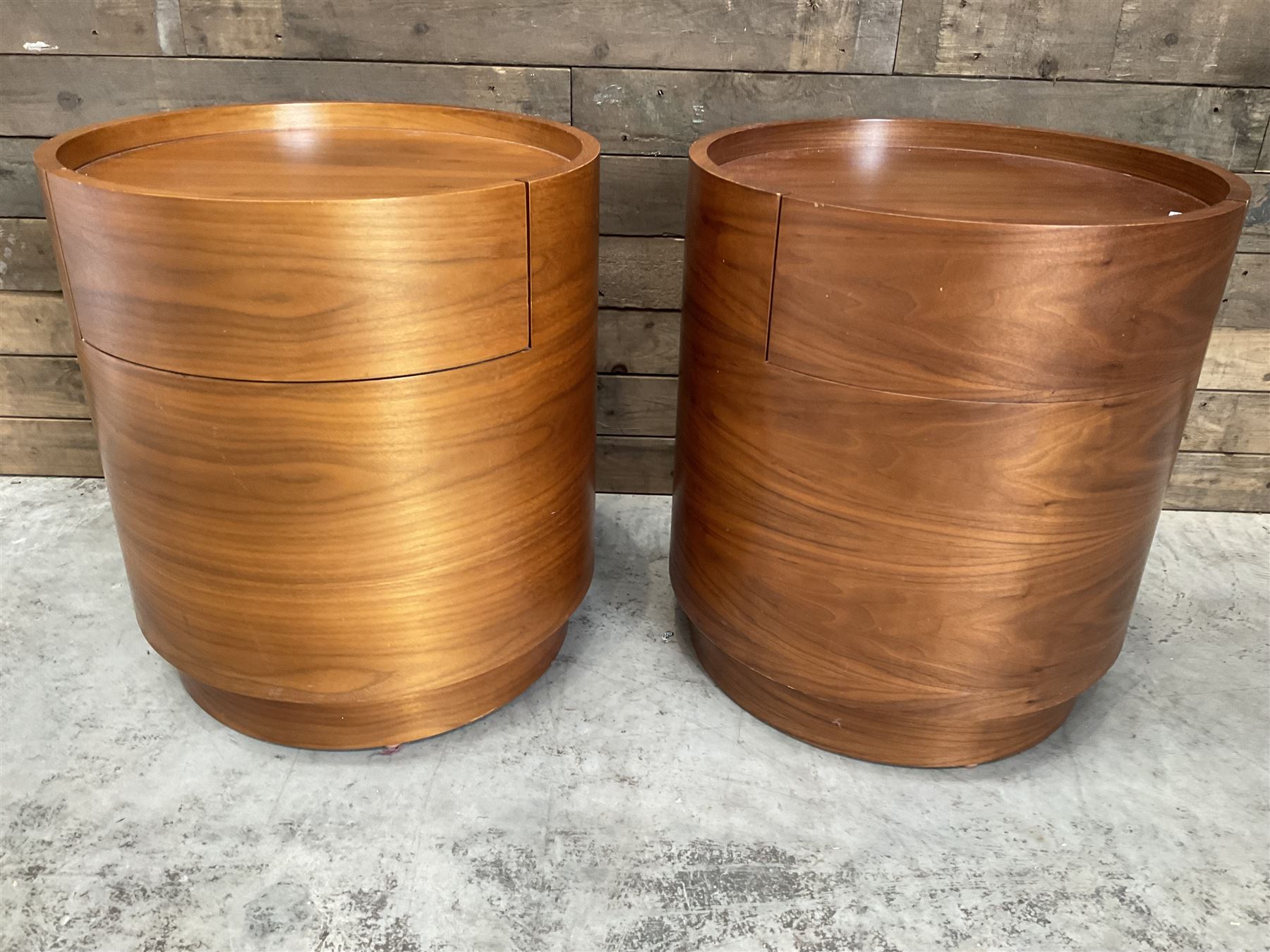 Pair of walnut circular barrel shaped lamp tables, fitted with single drawer