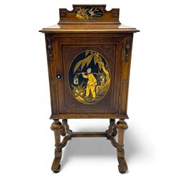 Early 20th century circa. 1920s oak bedside cupboard, raised back decorated with chinoiserie lacquer work depicting bird and flowers, moulded top over single door decorated with figure carrying bird cages, on turned supports united by shaped moulded stretchers, scroll carved feet