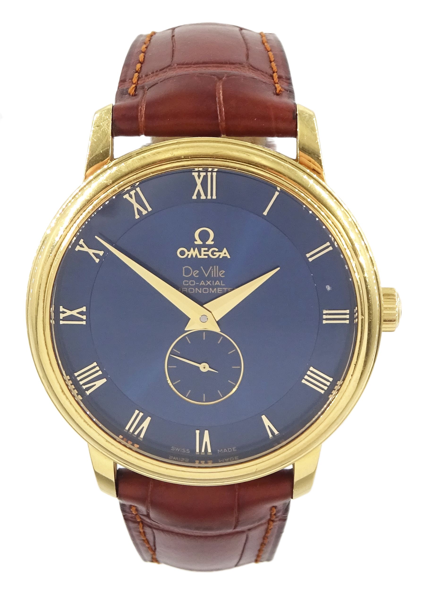 Omega De Ville gentleman's 18ct gold automatic Co-Axial chronometer wristwatch, Ref. 4613.80.02, Cal. 2202, serial No. 80844040, blue dial with Roman numeral hour markers and subsidiary seconds dial, on tan leather strap, with 18ct gold Omega buckle, boxed with cards and warranty card dated 12.06.06