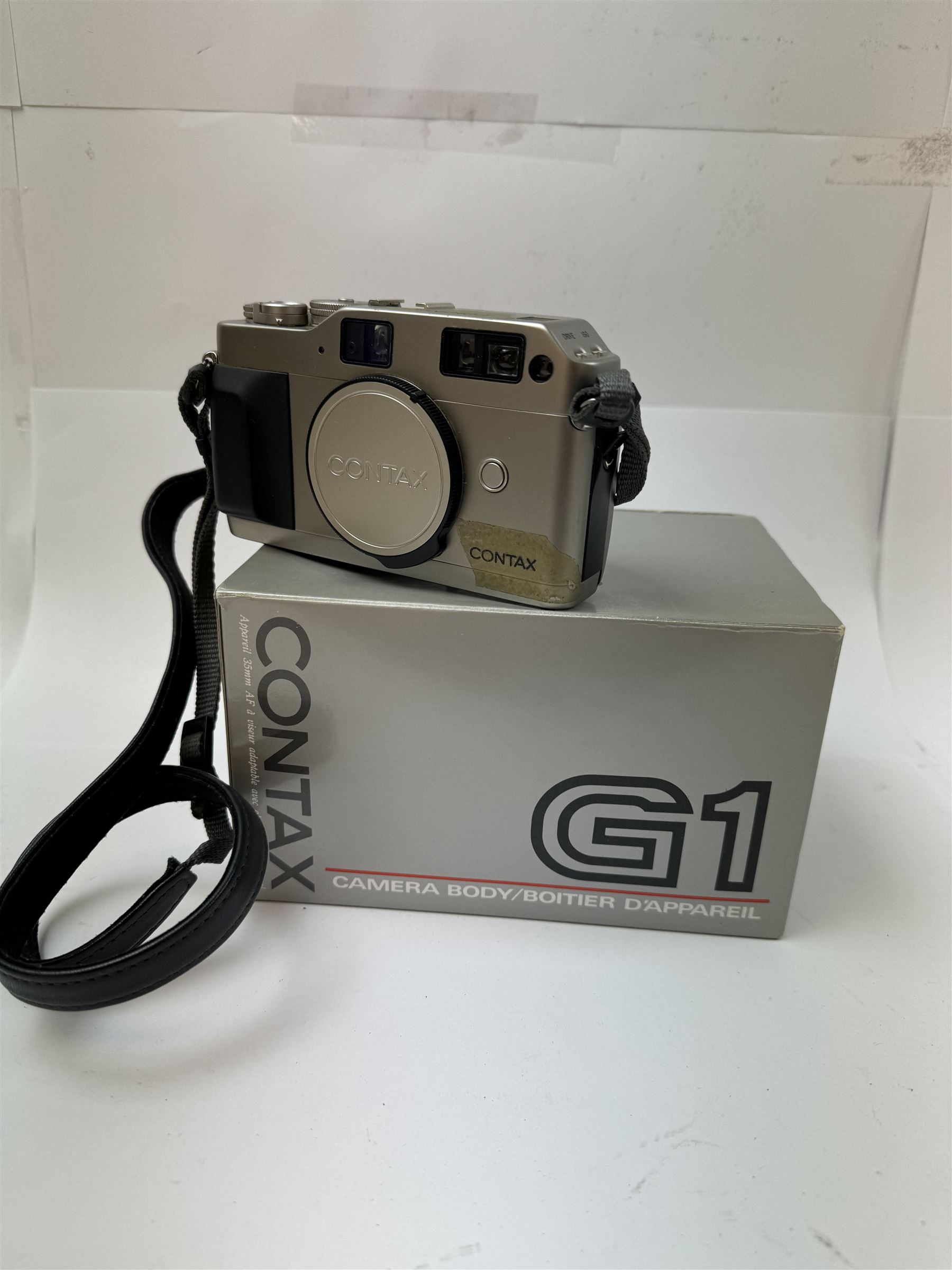 Contax G-1 rangefinder camera body, serial no. 077101, boxed with strap