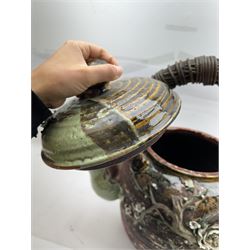 Very large Japanese Shigakari type coil built teapot, the body with a blossoming encrusted tree, woven loop handle and part green glazed spout and cover, H52cm