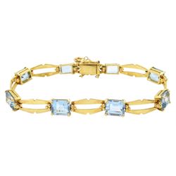 18ct gold eight stone graduating, octagonal cut aquamarine bracelet, total aquamarine weig...