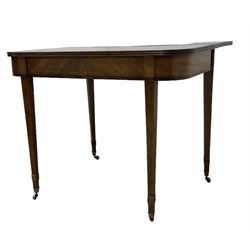 19th century mahogany tea table, fold-over top with reeded edge over inlaid frieze, on double gate-leg action square tapering supports, with brass castors