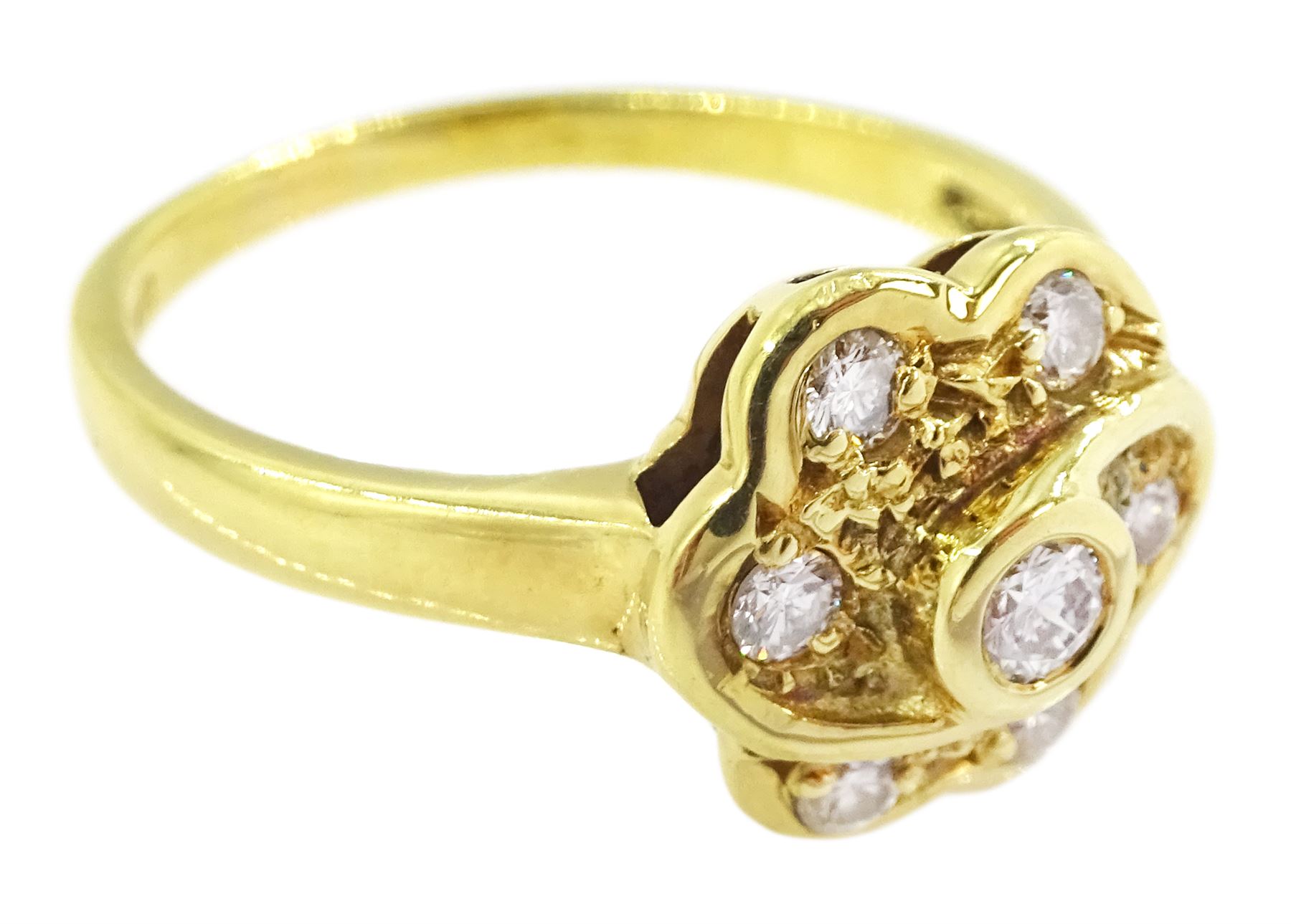 18ct gold round brilliant cut diamond flower head cluster ring, stamped, total diamond weight 0.25 carat