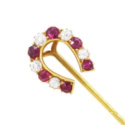 Early 20th century 18ct gold ruby and old cut diamond horseshoe stick pin, total diamond w...