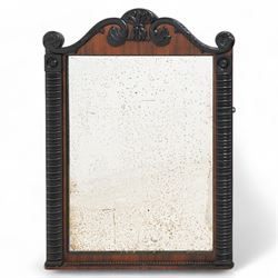 Early 19th century rosewood and ebonised overmantel mirror, scroll shaped pediment decorat...