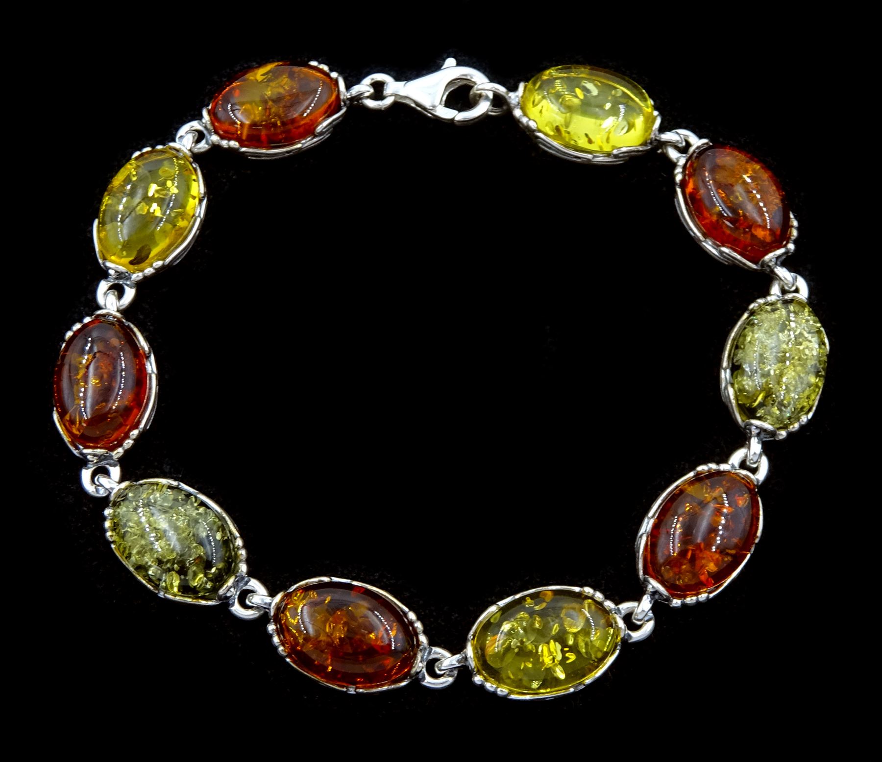 Silver tri-coloured oval amber link bracelet, stamped 925