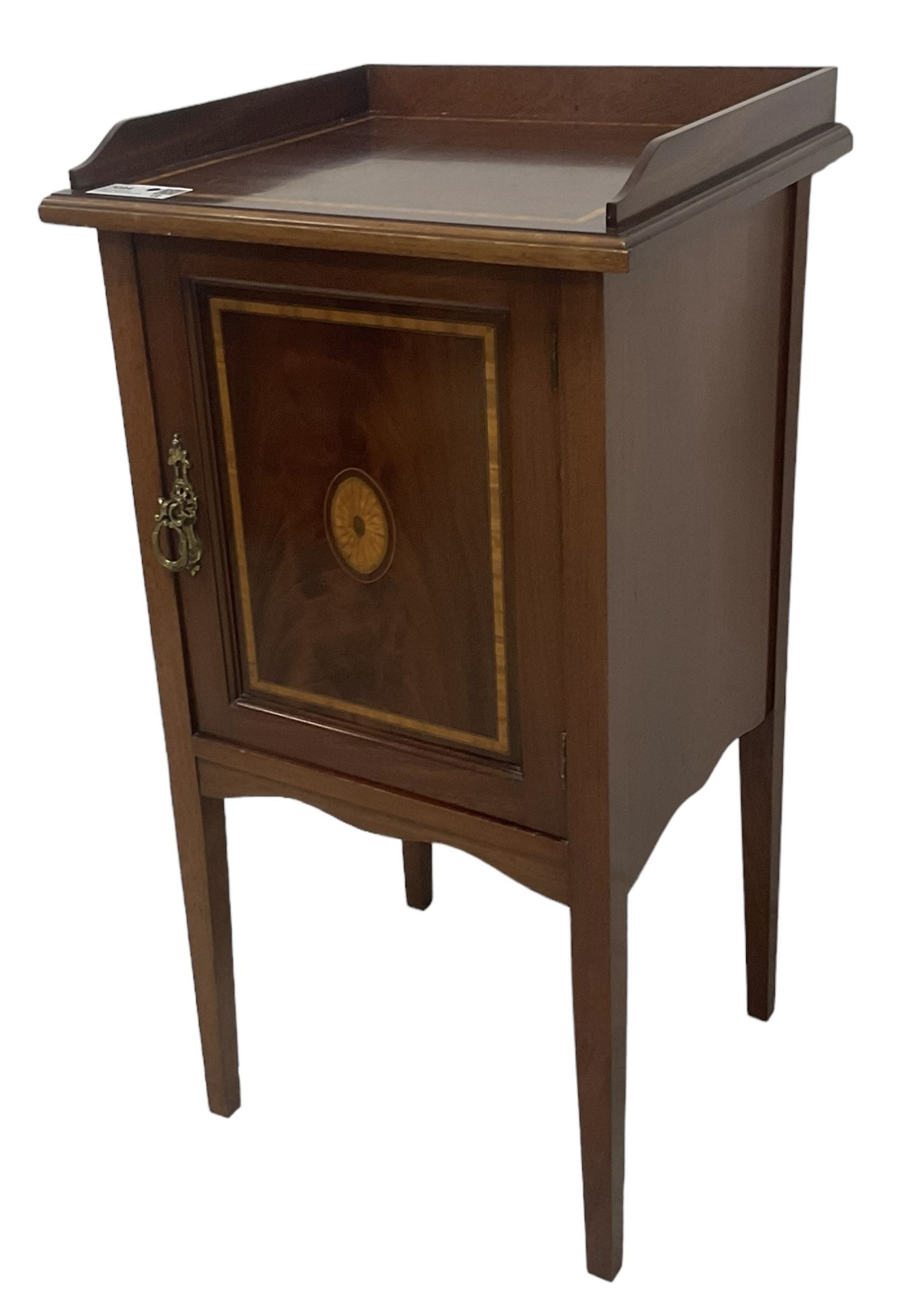 Edwardian inlaid mahogany pot cupboard, raised three-quarter gallery back, panelled door with fan inlay enclosing single shelf