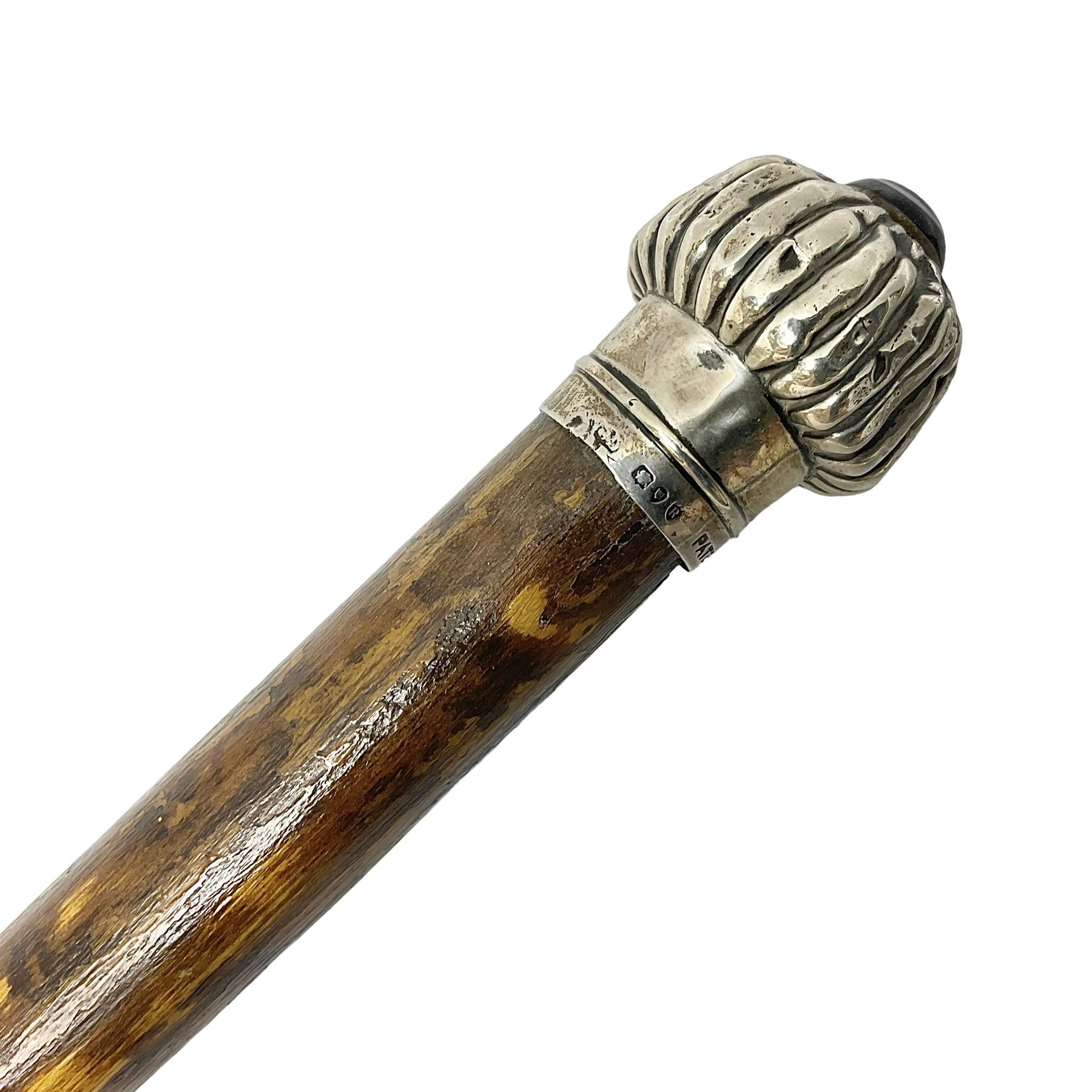 Victorian walking stick, the fluted silver pommel set with banded agate, hallmarked London 1892, maker's mark indistinct, L84cm