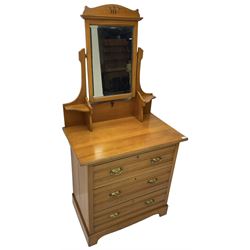 Edwardian satin walnut dressing chest, raised bevelled mirror back, the base fitted with three drawers