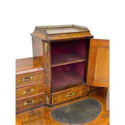 19th century French figured walnut Bonheur de Jour or writing desk, the upper section with brass gallery over mirror glazed cupboard and a combination of drawers, shaped and moulded top with leather inset and satinwood band, fitted with single drawer, on cabriole supports, inlaid throughout with scrolling foliate decoration in boxwood, ornate cast brass mounts 