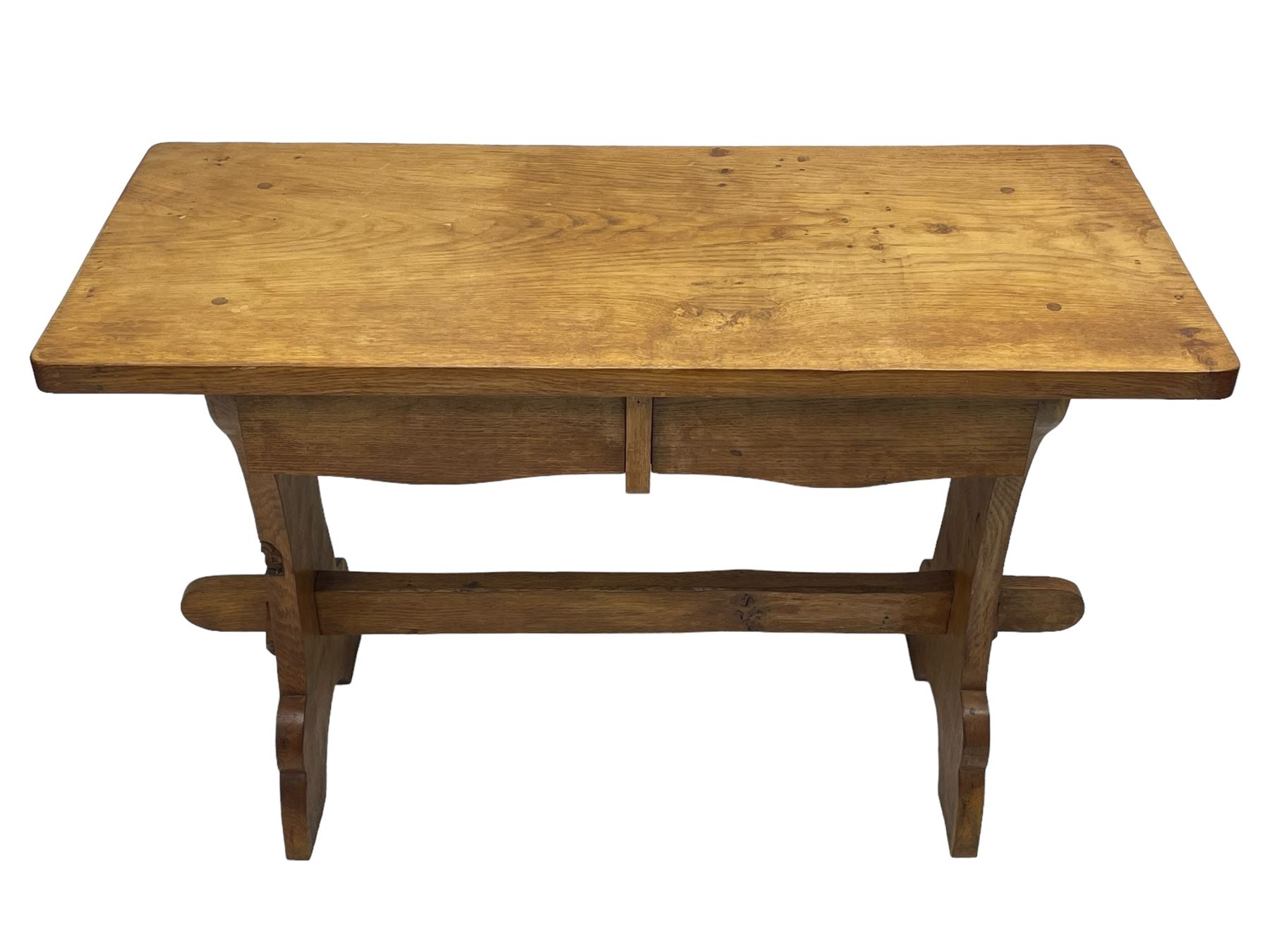 Gnomeman - oak side table, rectangular adzed top over two drawers, on shaped end end supports united by pegged stretcher, carved with gnome signature, by Thomas Whittaker, Littlebeck 