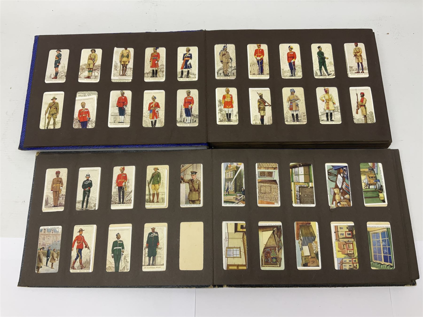 Four albums of cigarette cards, including Will's and Player's examples