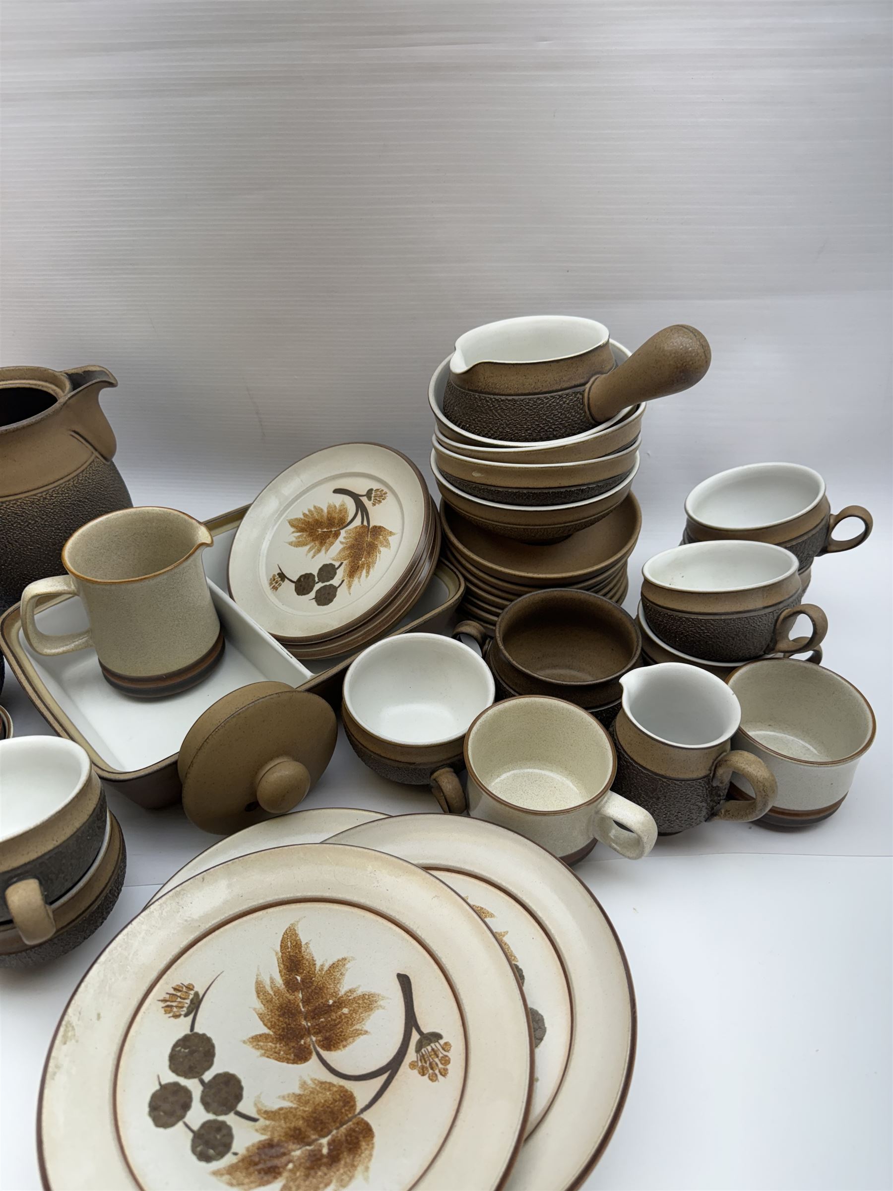 Denby Cotswold pattern, part tea and dinner service, including eight dinner plates, eight tea cups and saucers, serving dishes etc  