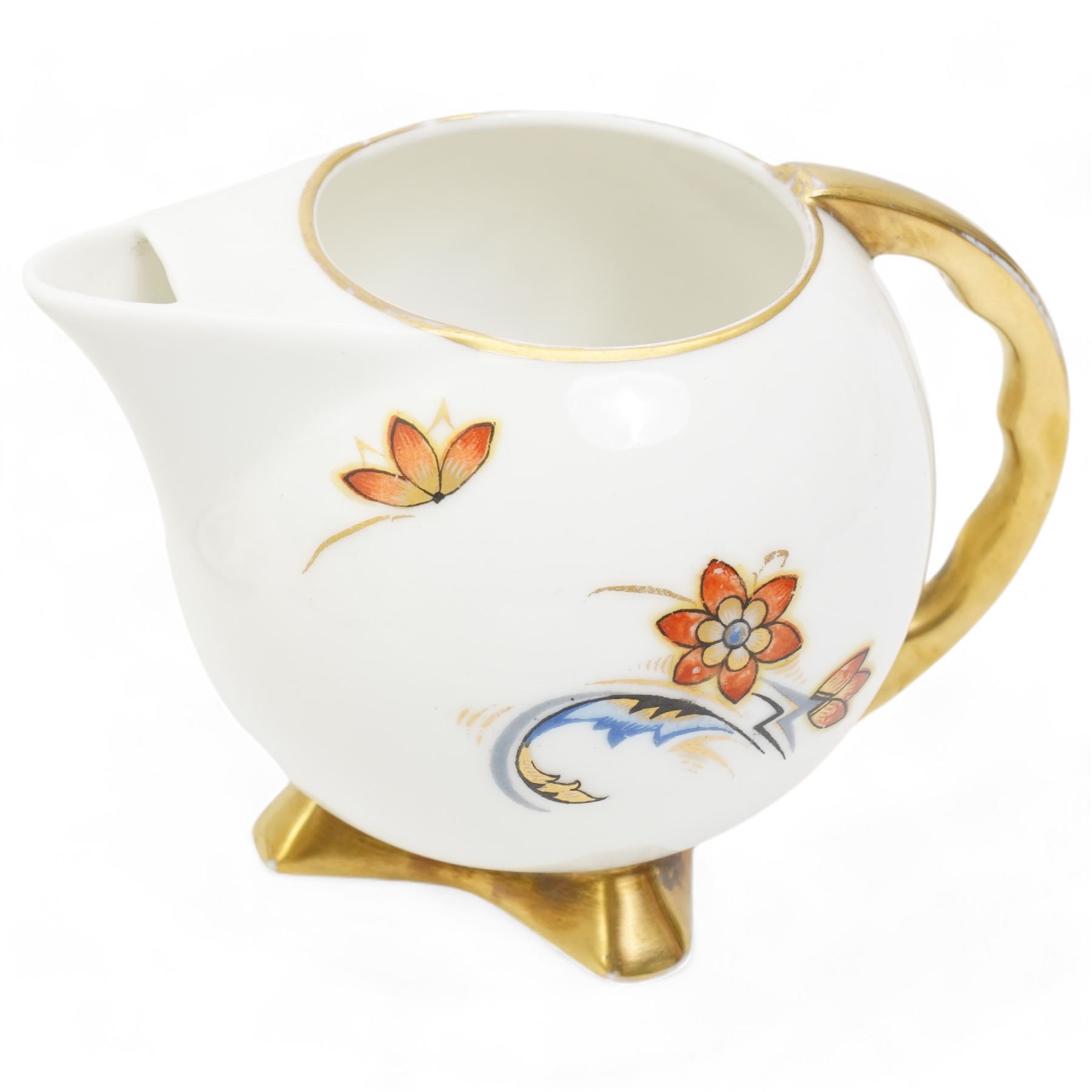 Polish Art Deco style tea service by Cmielow, of globular form with gilt handles and angular splayed feet, comprising teapot, sucrier, milk jug and six cups and saucers, post 1930 printed mark beneath