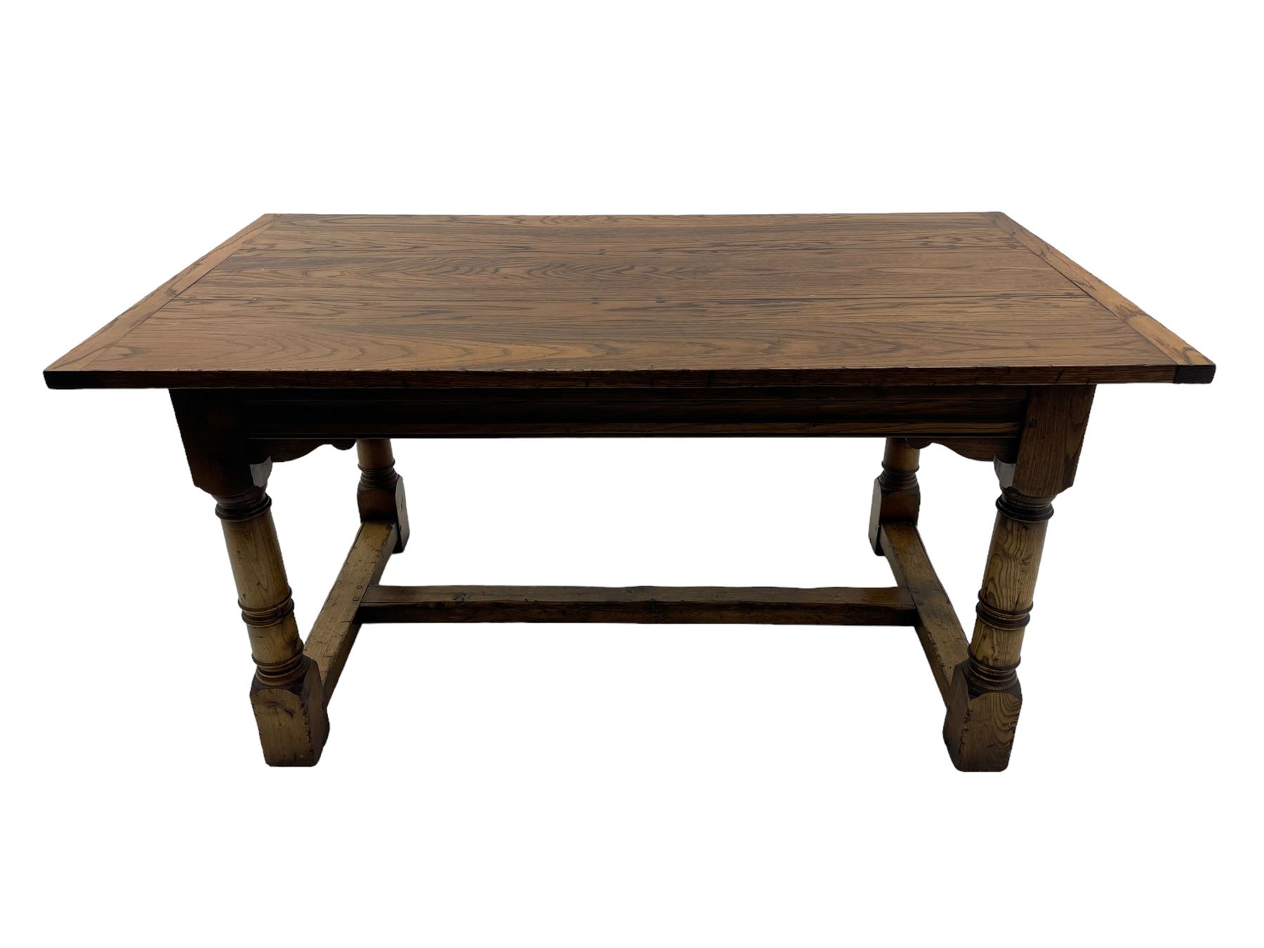 Oak refectory dining table, rectangular three plank top with cleated ends, two additional leaves, on turned supports united by H-stretchers 