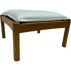 Ercol - mid century oak footstool of concave square form, detachable cushion upholstered in celadon green fabric, on straight legs with rounded corner