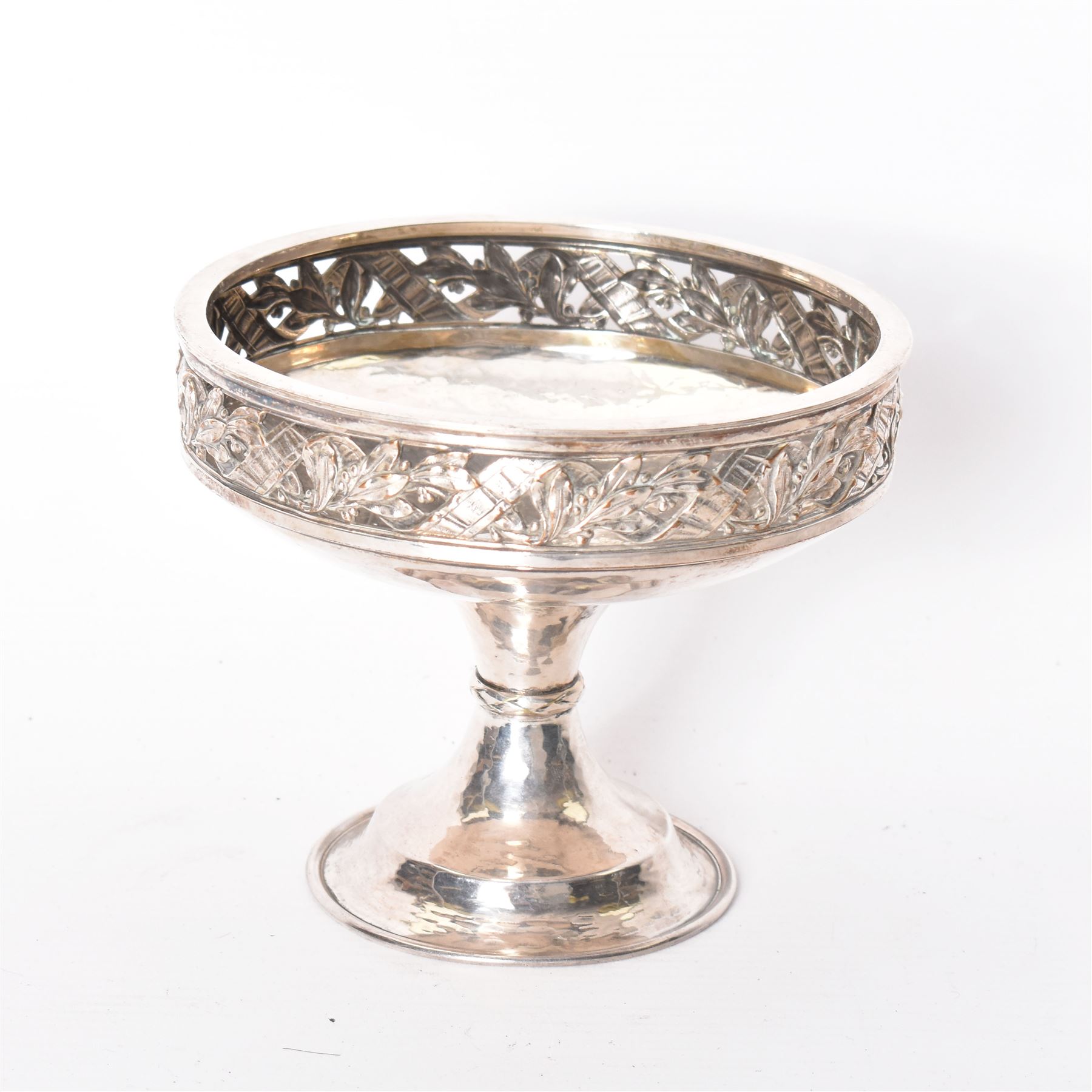 Arts & Crafts silver on copper pedestal dish, the circular bowl with hammered finish, and pierced foliate rim, upon a knopped stem, impressed 1665, H11cm