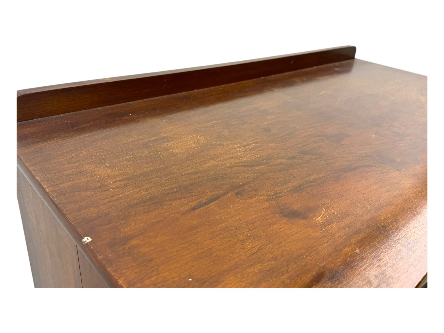 Early 20th century walnut chest, fitted with four short and four long drawers, on recessed plinth base