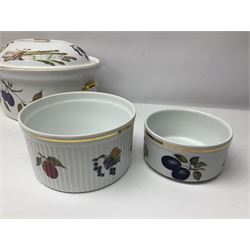 Royal Worcester Evesham pattern, including covered pot de cremes, twin handle tureen, serving dishes, flan dishes, side plates etc  