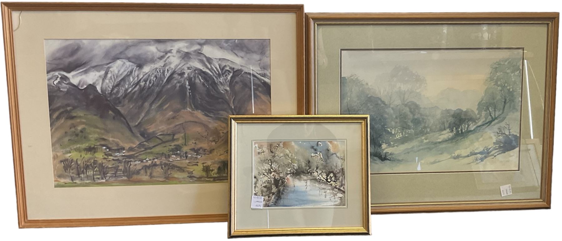 N Miller (British 20th Century): Snowy Mountains, oil pastel signed and dated '78 together with a watercolour by Tom McAndrew and another similar indistinctly signed (3)