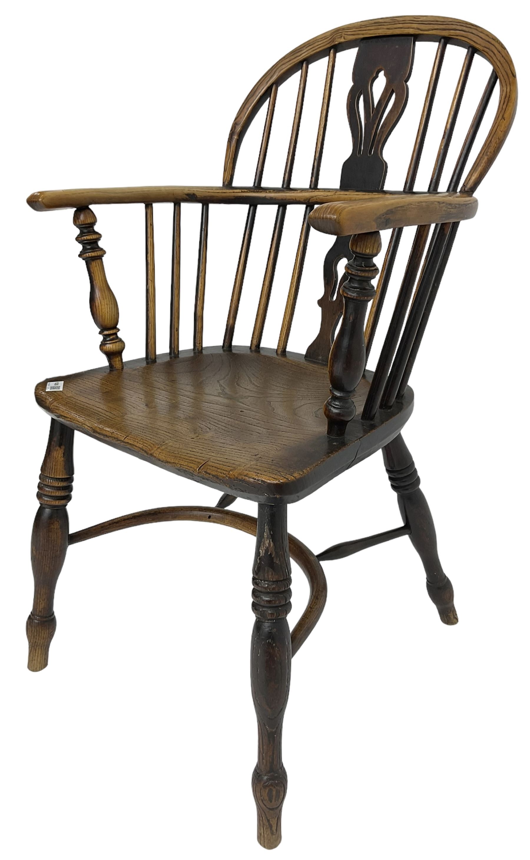 19th century elm and ash Windsor armchair, low double hoop and stick back with shaped and pierced splat, on turned supports united by crinoline stretcher