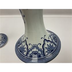 Pair of Delft blue and white vases, of elongated baluster form with shaped fluted rim, one depicting a Dutch sailing scene, the other a Dutch windmill scene, with painted mark beneath, H35.5cm