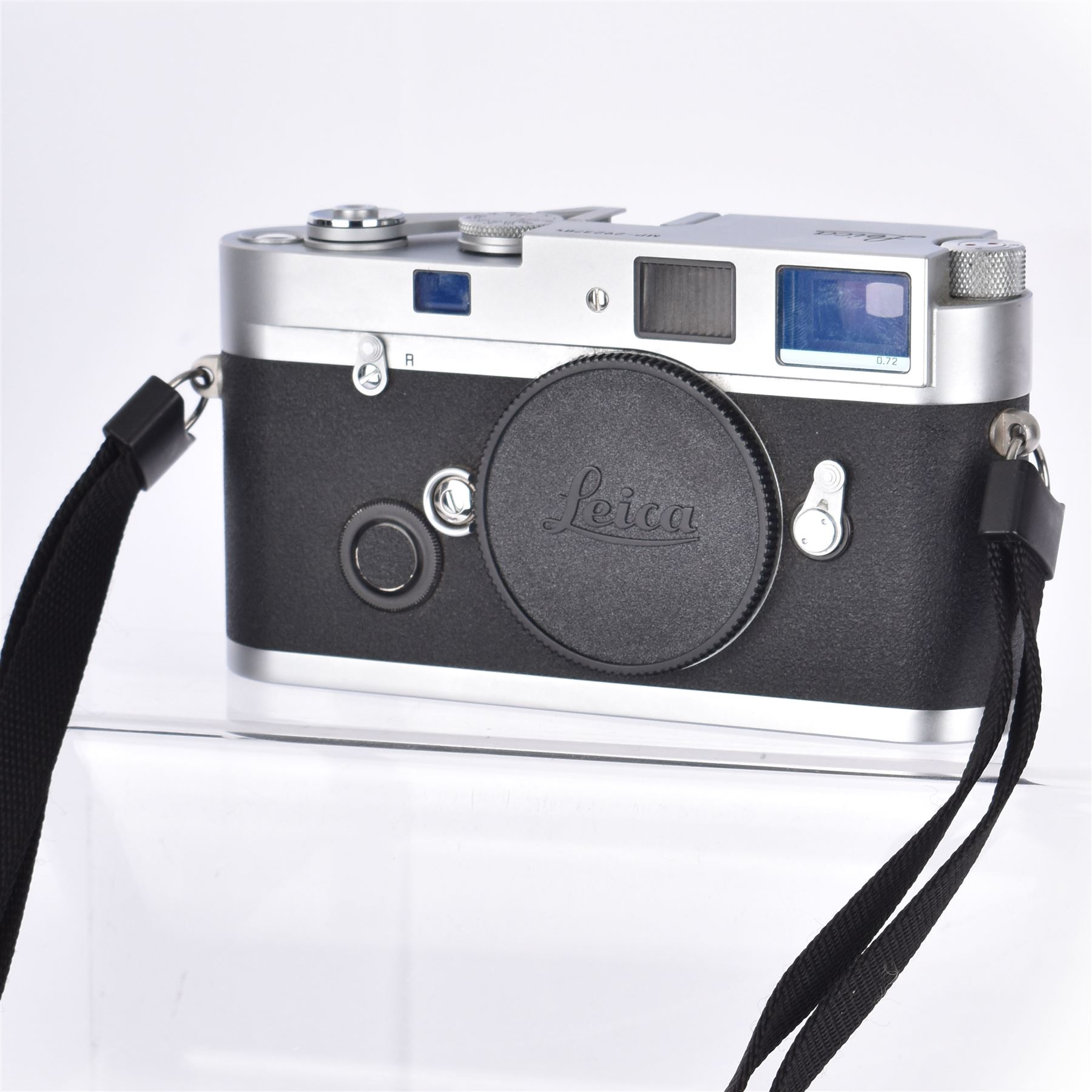 Leica MP 0.72 35mm film rangefinder camera body, in silver, chrome and black small grain leatherette finish, serial no. 2923784, made in Germany circa 2003, with Leica shoulder strap