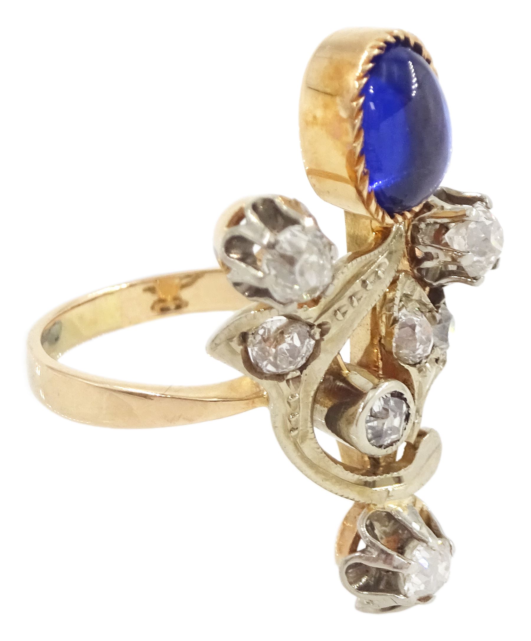 Russian early 20th century 14ct rose and white gold, oval cabochon cut synthetic sapphire and old cut diamond flower design ring, stamped 585 with Soviet star, total diamond weight approx 0.60 carat