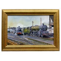 Bernard Whitaker (British 20th century): Trains in the Station, oil on board signed verso 30cm x 48cm