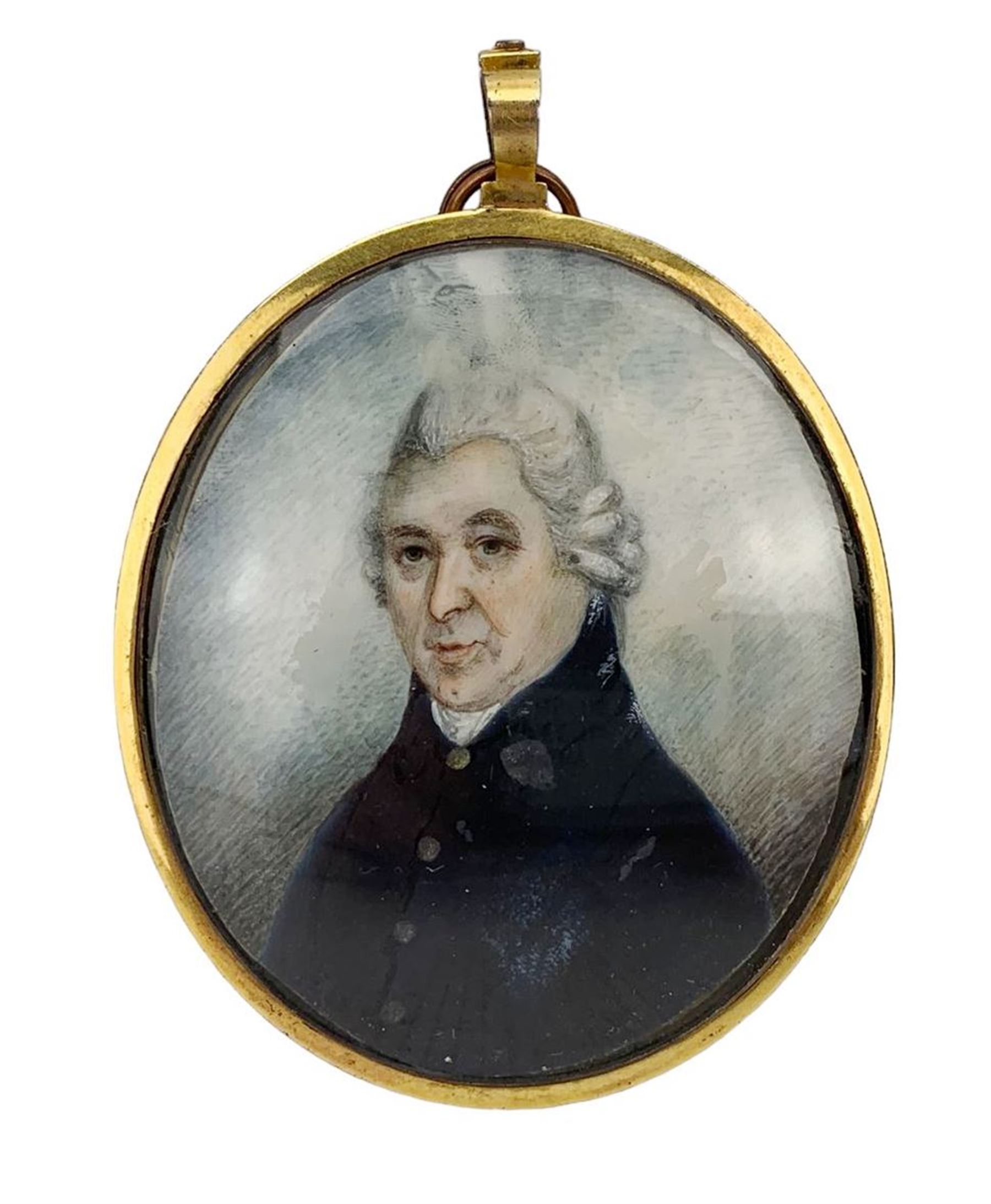 English School (18th/ early 19th century): Miniature portrait of a Gentleman, head & shoulder length, watercolour on ivory, unsigned, the reverse with blue guilloche enamel border and engraving of a gentleman, within an oval brass frame, 6.5cm x 5.5cm. This item has been registered for sale under Section 10 of the APHA Ivory Act