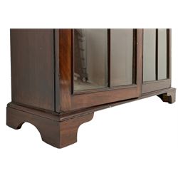 Early 20th century mahogany bookcase, fitted with two astragal glazed doors enclosing three adjustable shelves