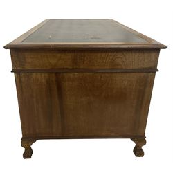 Georgian design twin pedestal desk, rectangular top with green leather inset, fitted with nine drawers, on cabriole supports with ball and claw feet 