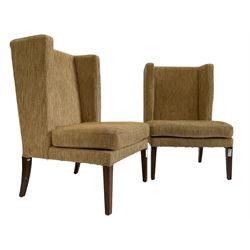 Two wing back armchairs, upholstered in oatmeal fabric