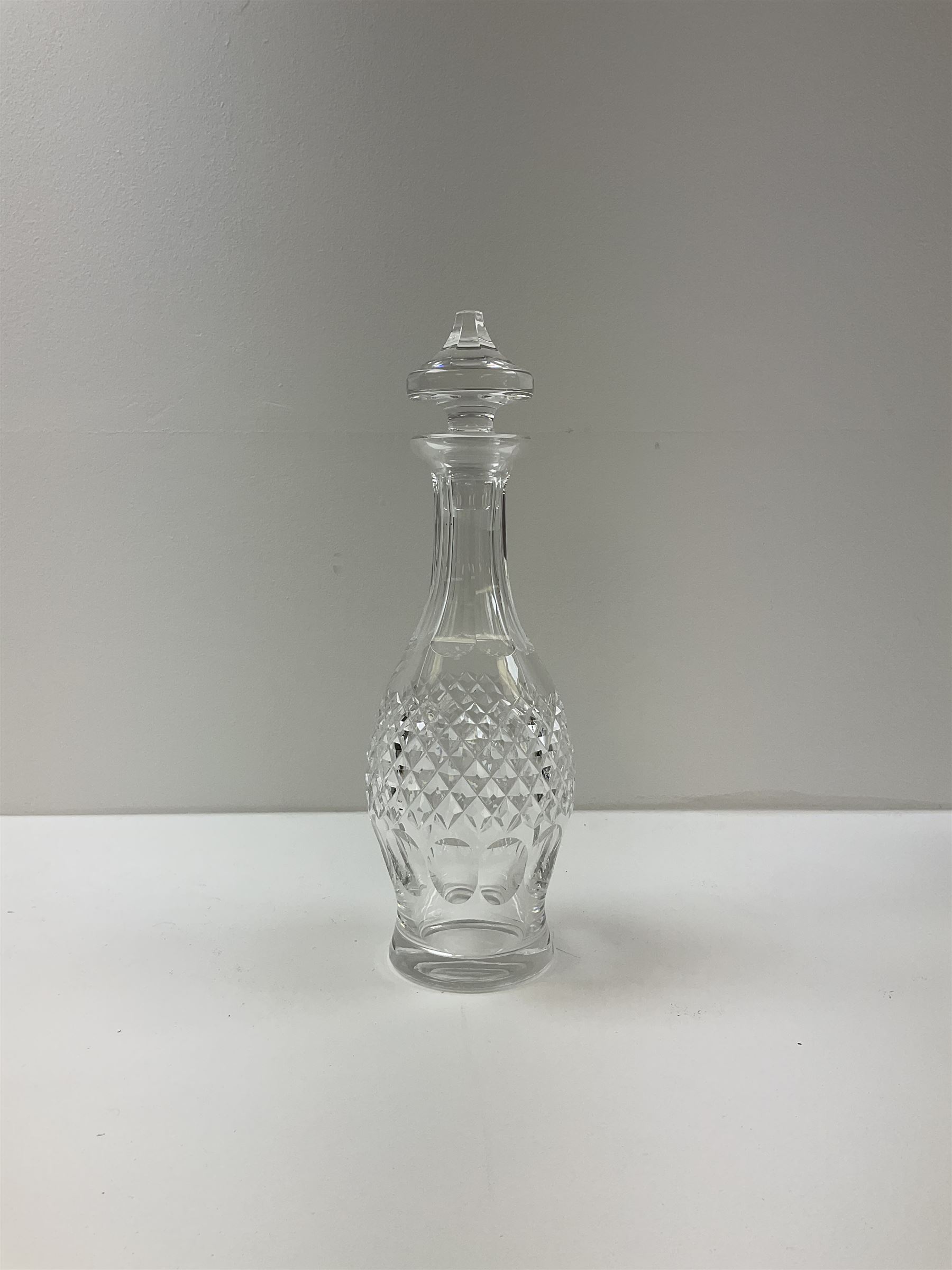 Orrefors glass decanter, singed to base, together with two Waterford cut crystal decanters, tallest H34cm