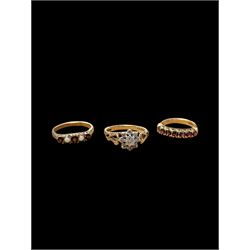 Two 9ct gold stone set rings, to include illusion set diamond cluster ring and seven stone...