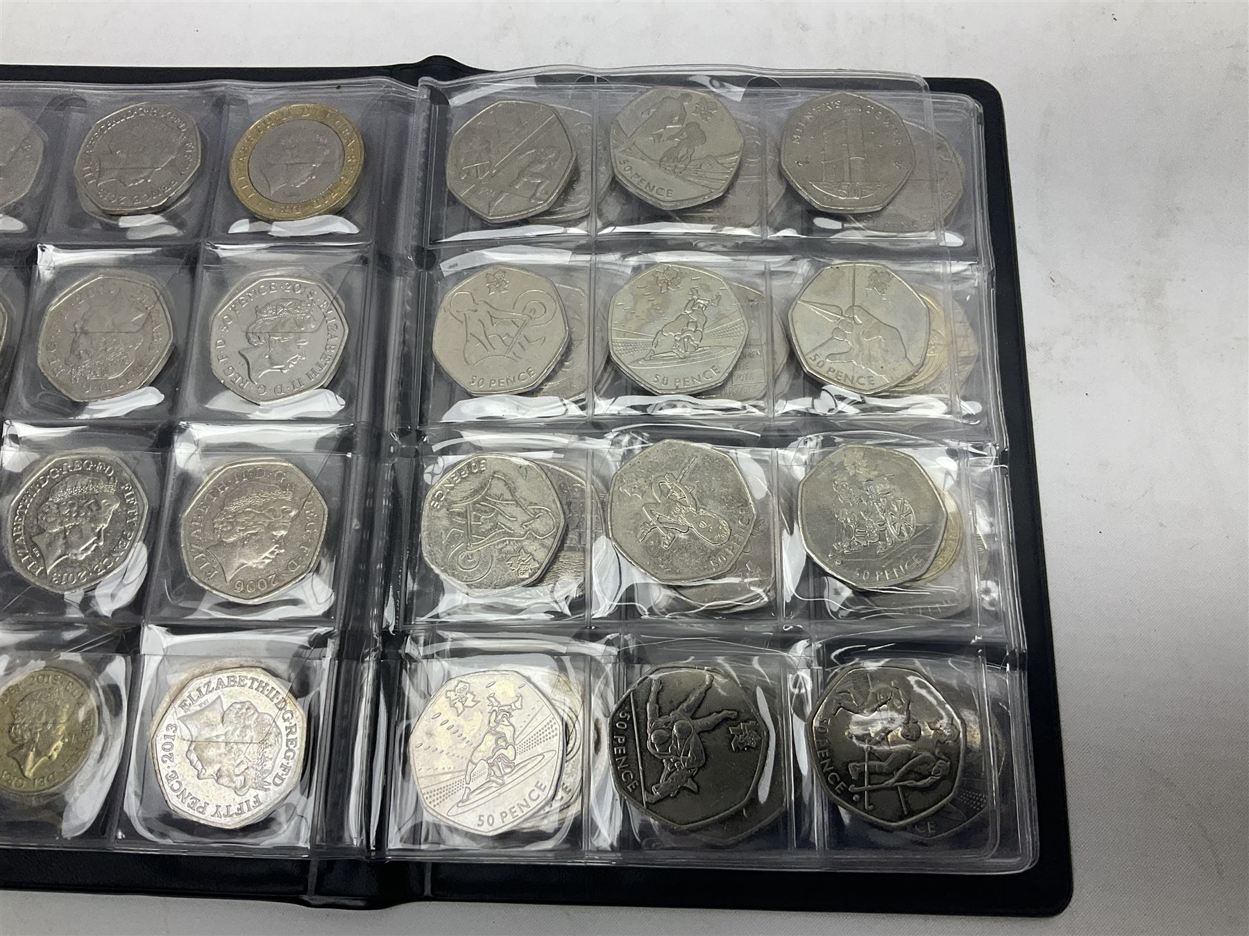 Queen Elizabeth II mostly Great British commemorative fifty pence coins, including London Olympics 2012 sports collection coins on cards, other loose Olympic games, Beatrix Potter, 2022 '1952-2022' fifty pence in plastic holder etc