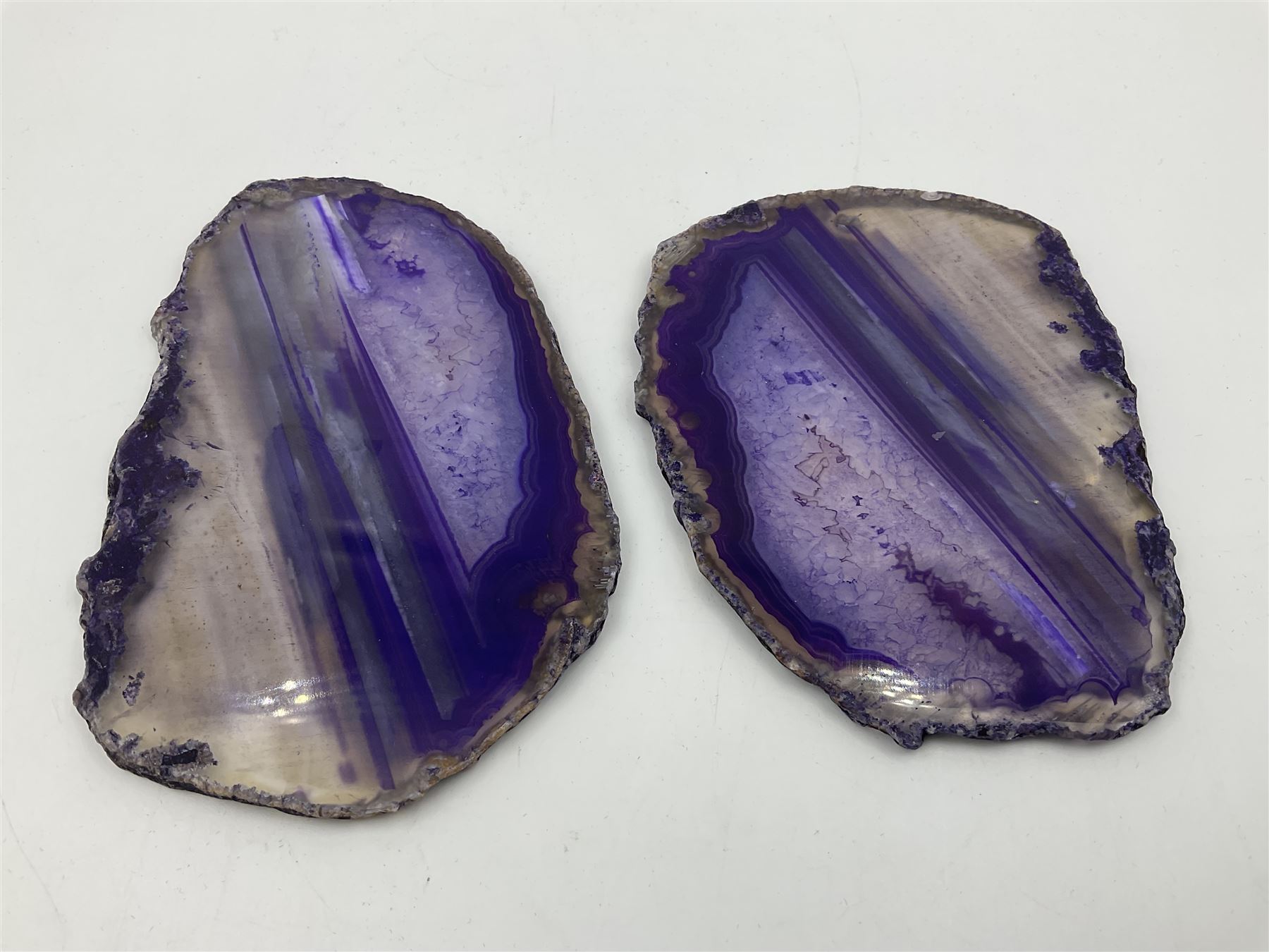 Pair of purple agate slices, polished with rough edges, H9cm, L11cm