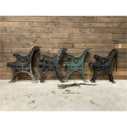 Four pairs of ornate cast iron bench ends (8)