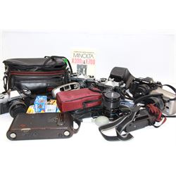 Collection of cameras, including Minolta, Fujica, and Kodak examples and accessories