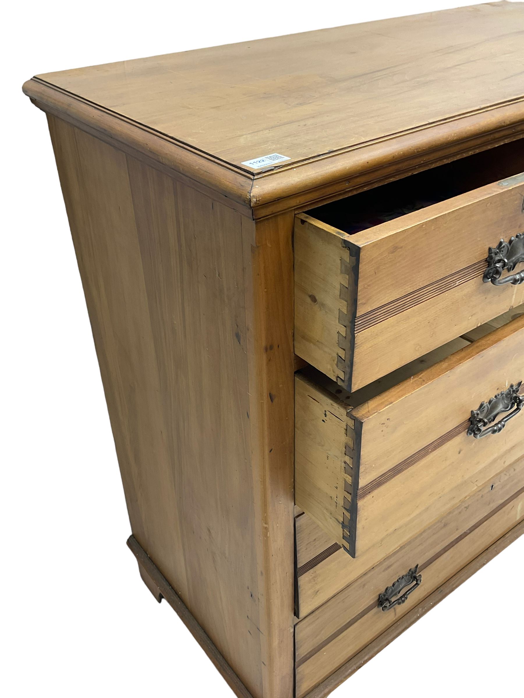 Edwardian satin walnut chest, fitted with two short and three long drawers, on bracket feet