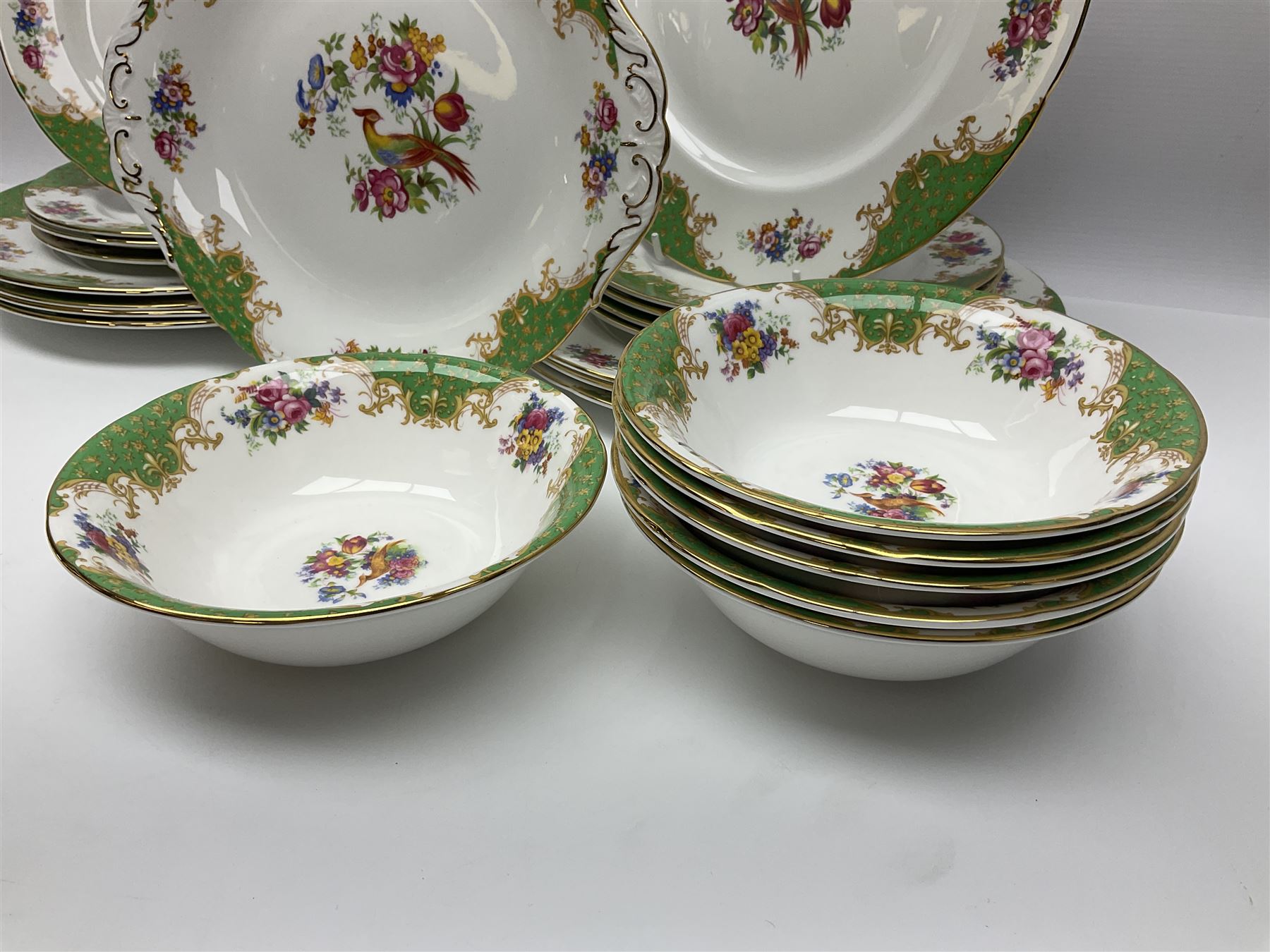 Paragon Rockingham pattern part tea and dinner service including eight cup and saucers of various sizes, eight dessert plates, eight dinner plates, etc (48)