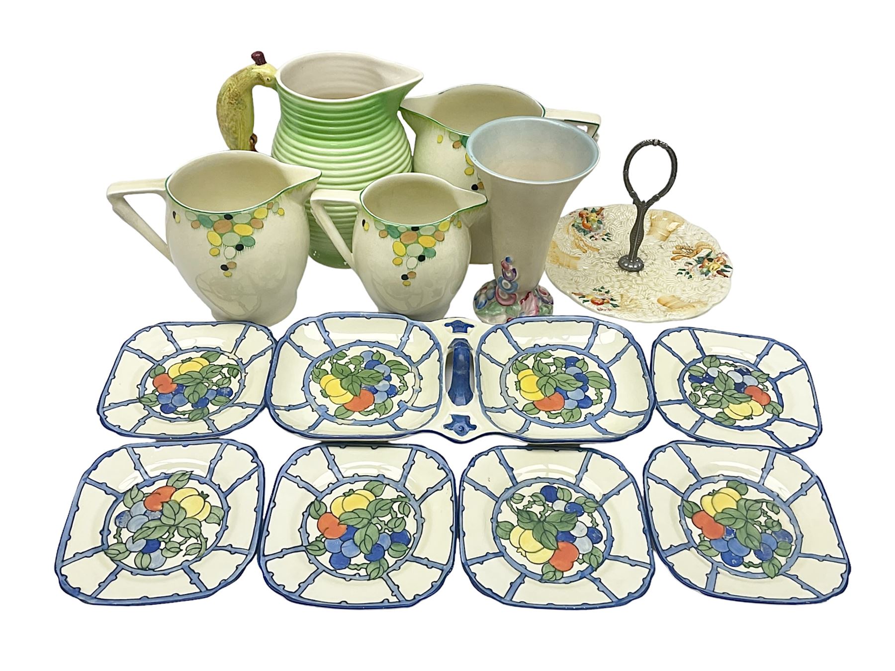 Collection of 1930s ceramics, comprising Shorter & Son jug with bird handle, set of three J.H.W & Sons graduating jugs, Clarice Cliff My Garden pattern vase and Celtic Harvest pattern cake plate and a Burleigh Ware sandwich plate set, bird jug H21cm