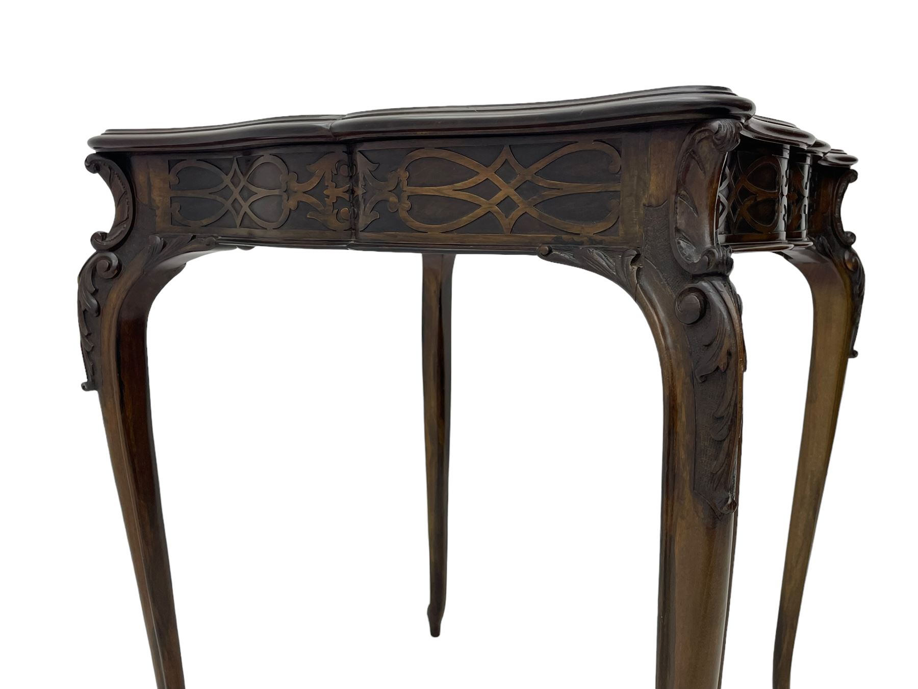 Early 20th century mahogany centre table, shaped moulded top over shaped frieze rails decorated with blind fretwork, on C-scroll and acanthus leaf carved cabriole supports with scrolled terminals 