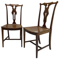 Early 20th century pair of mahogany side chairs, shaped cresting rail over shaped and pierced splat carved with curled leaf decoration, dished seat on square tapering supports united by H-stretchers 