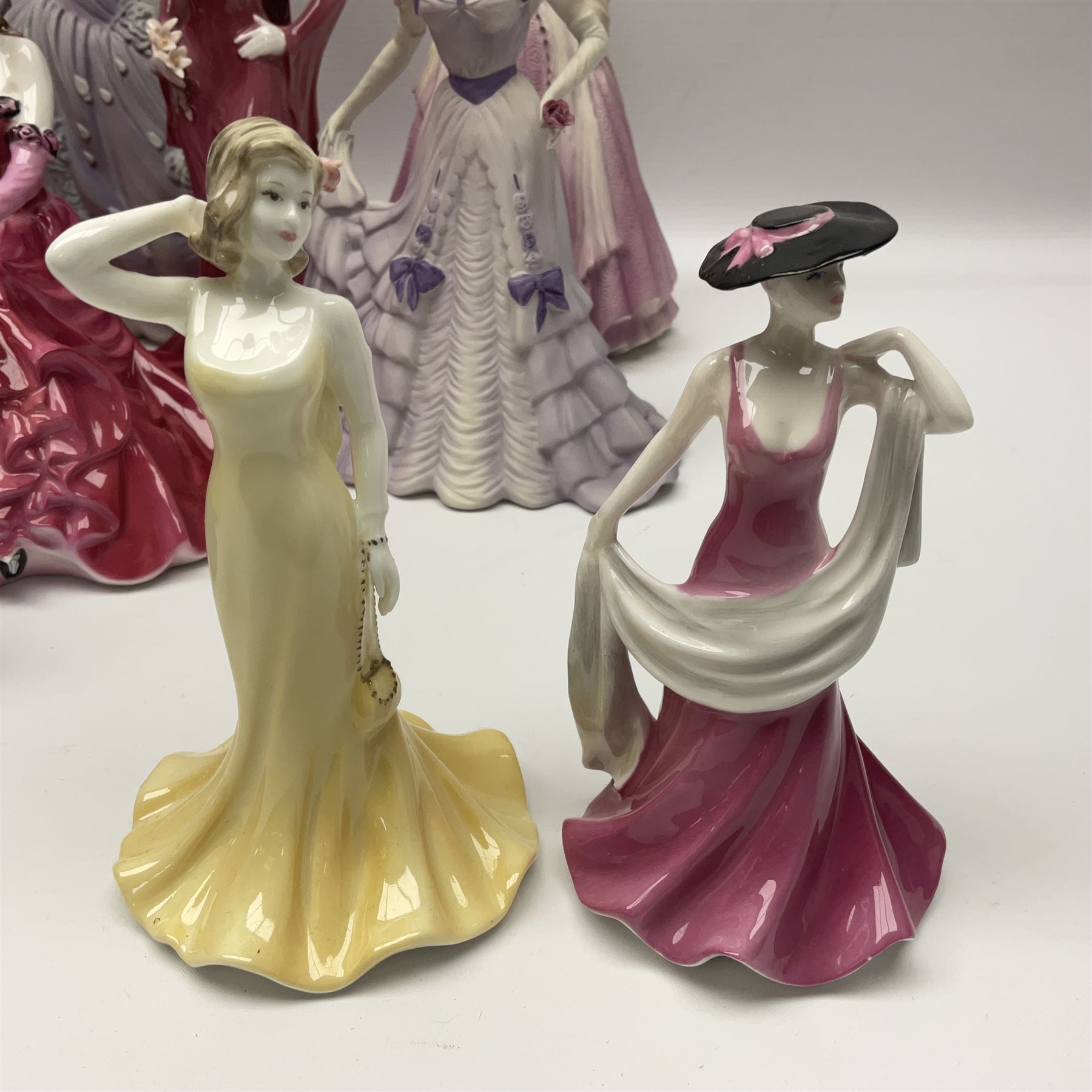 Nine Coalport figures, including Age of Elegance Evening Promenade, The Lovely Lady Christabel and Ladies of Fashion Pamela, together with eight miniature Coalport figures