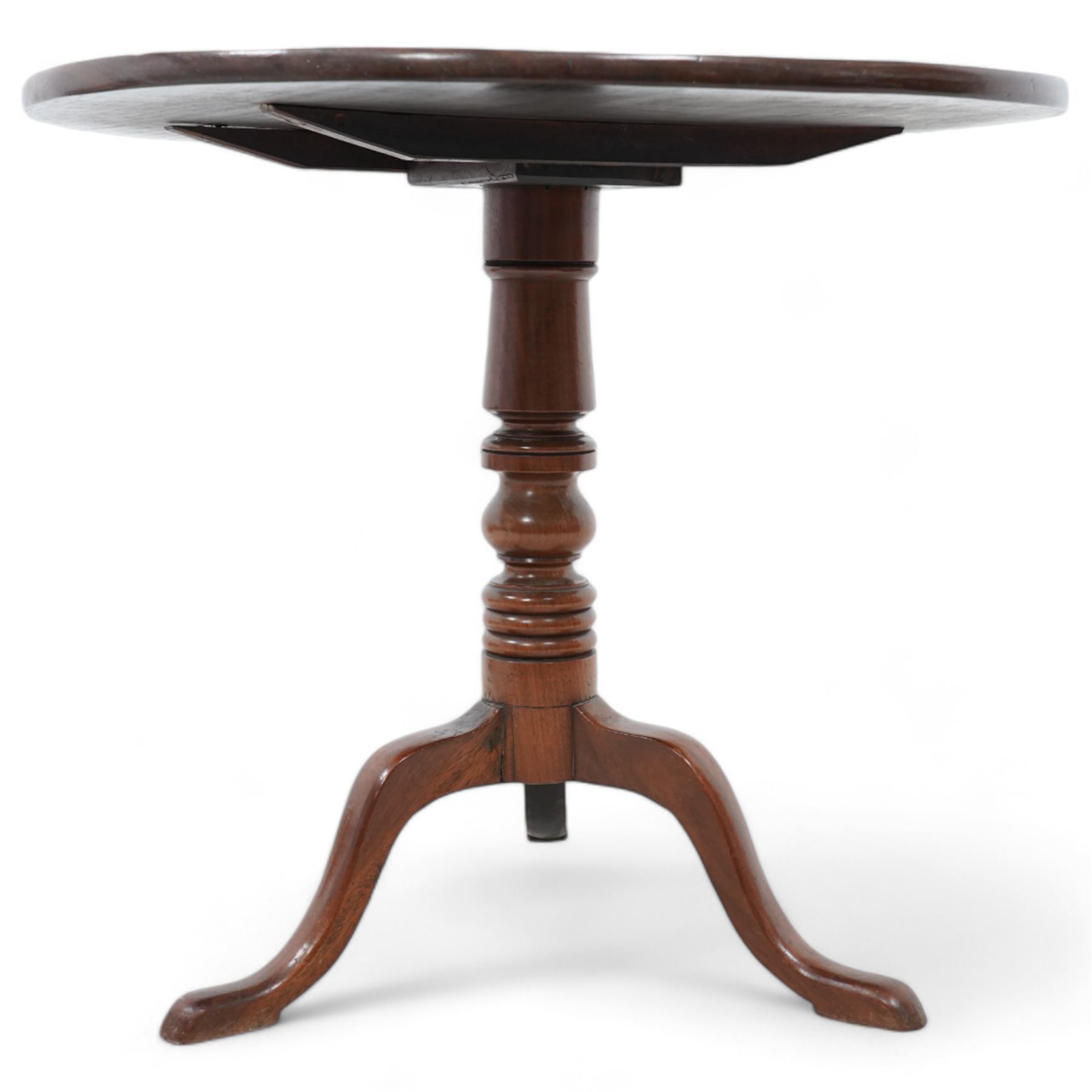 Georgian mahogany tripod table, circular tilt-top on turned column with three out splayed supports 