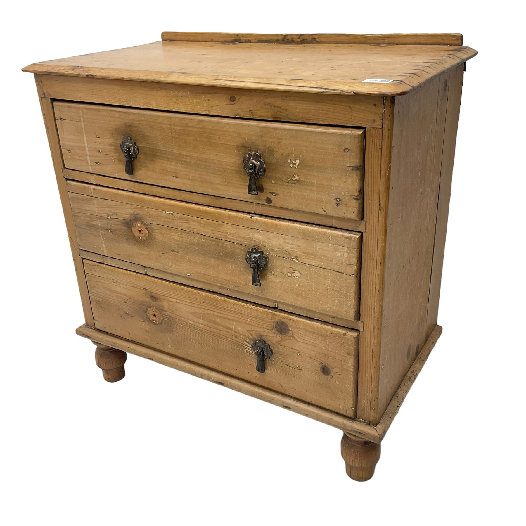 Victorian stripped pine chest, fitted with three drawers and raised on turned feet